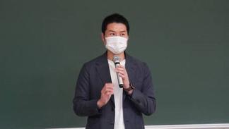 講演する村田氏