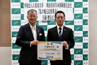 永田理事長（左）と佐藤支社長（右）